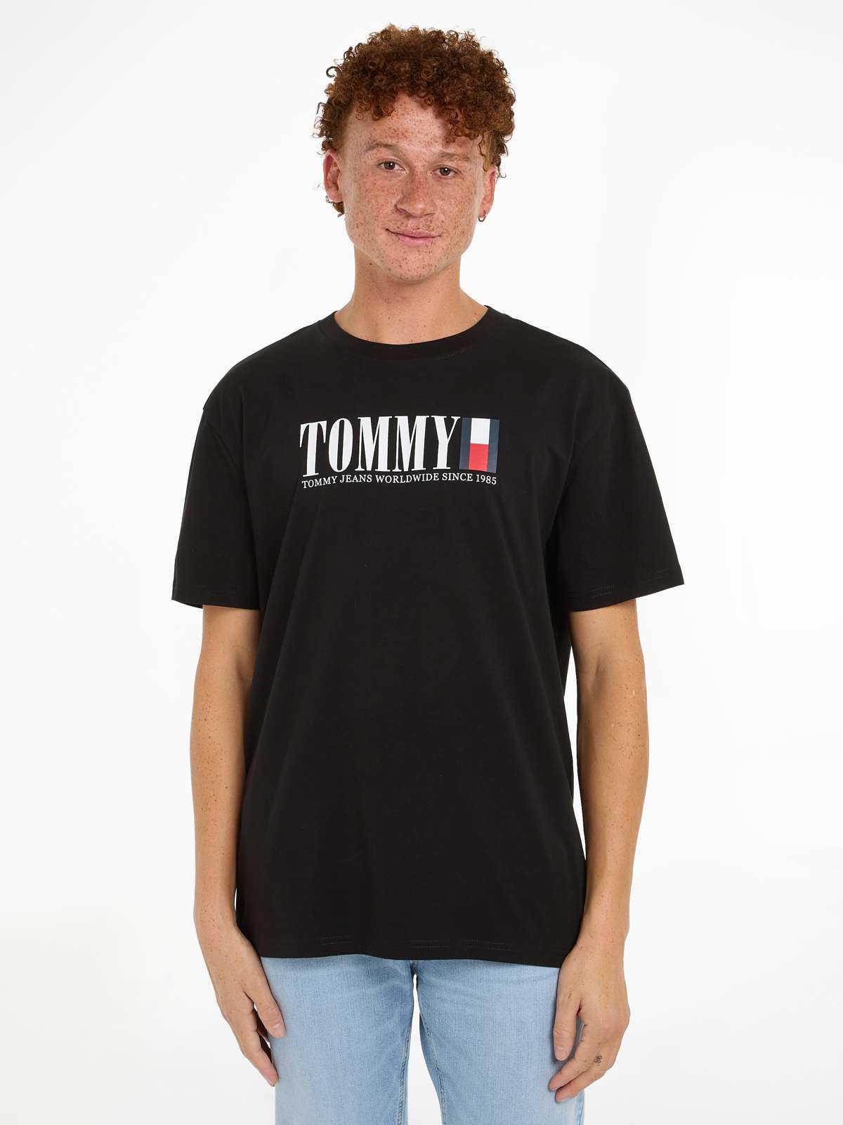 Футболка с логотипом»TJM REG TOMMY DNA FLAG TEE EXT«